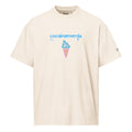 T-shirt oversize bianca vintage con grafica streetwear azzurra "cocainamerda" e simbolo gelato rosa, messaggio forte.