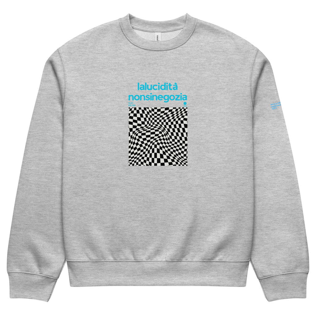 Felpa oversize grigia con grafica manifesto nera a scacchi distorti e scritta blu streetwear "lalucidità nonsi negozia" sul.
