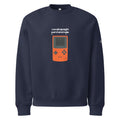 Felpa navy girocollo oversized con grafica videogioco arancione e scritta bianca "cocainapaghi per stare male" streetwear.