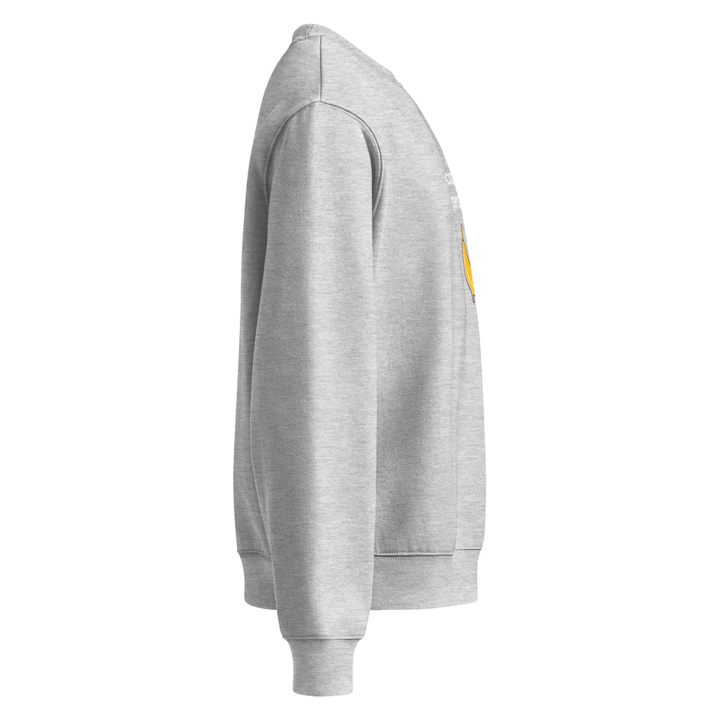 Felpa girocollo oversize grigia con maniche lunghe, stile streetwear, grafica manifesto con scritta bianca parziale visibile .