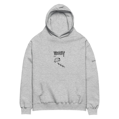 Felpa oversize grigia in cotone con cappuccio, grafica nera centrale con scritta "laluciditàèpotere" e disegno pecora, stile .