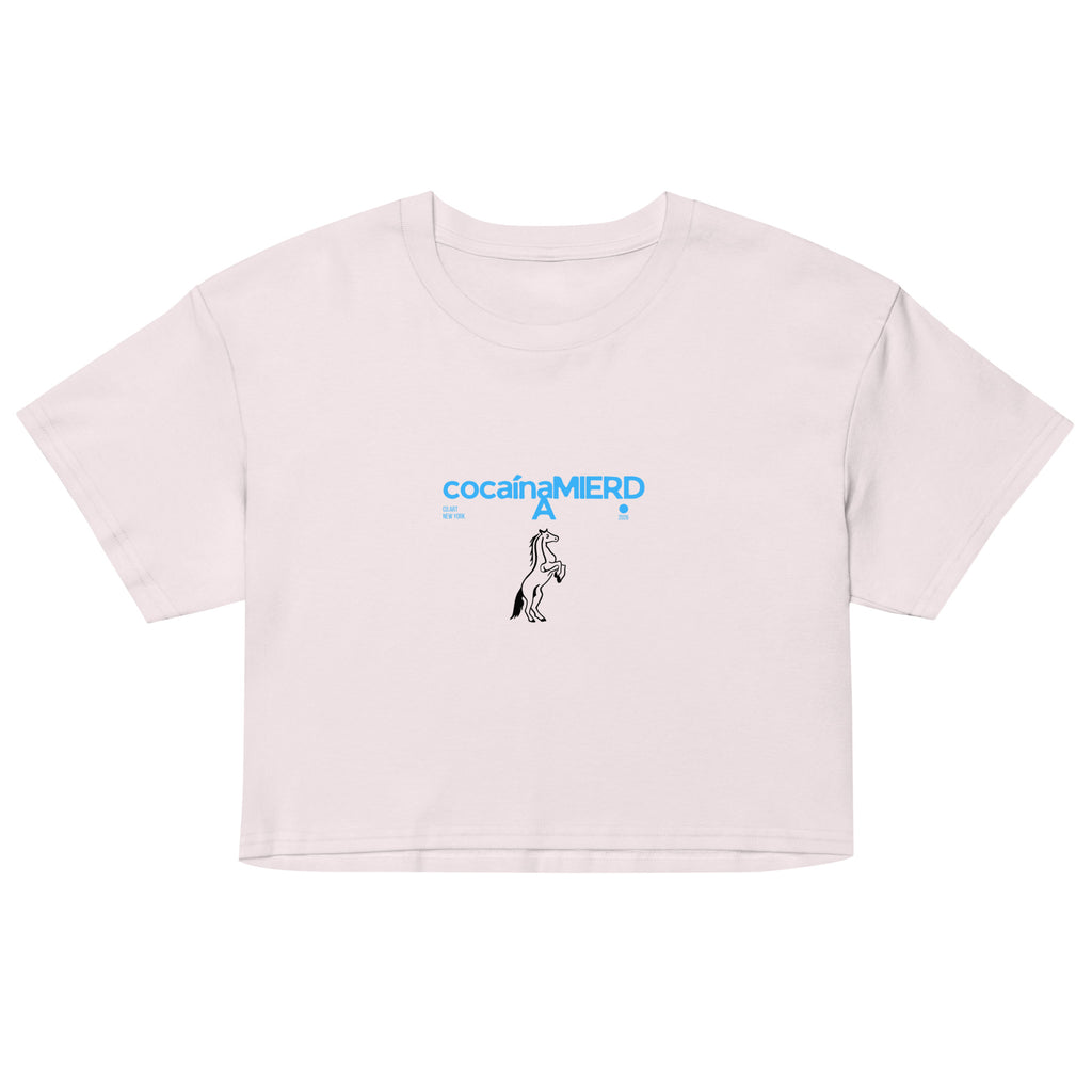 Crop top orchid in cotone con scritta blu "cocainamierda" e grafica unicorno centrale, stile streetwear con messaggio forte.